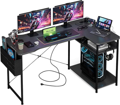 Acrolix L Shaped Gaming Desk 55 Inch - Computer Corner Desk with Power Outlets, Reversible Shelves & Storage Bag for Home Office, PC Gaming Table, Black Carbon