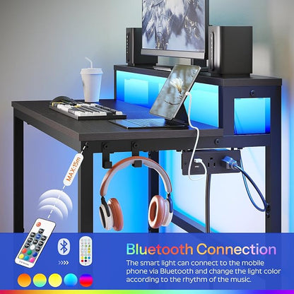 YATINEY Small Computer Desk with Charging Station and LED Lights, Gaming Desk with Monitor Stand, 2-Tier Home Office Desk with 4 Side Hooks, for Living Room, Home Office, Black DN01UDBBY2