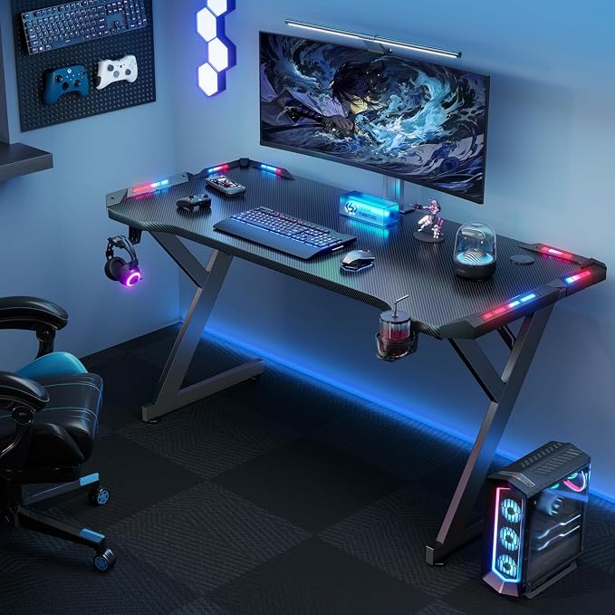 HLDIRECT 47 Inch Gaming Desk with LED Lights, Ergonomic Computer Gaming Table with Carbon Fibre Surface, Sturdy PC Workstation Desk for Home Office with Headphone Hook, Cup Holder, Black