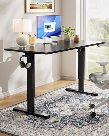 HUANUO Electric Standing Desk, Whole Piece Desktop, Adjustable Height Computer Desk, 4 Height Memory Settings, Sit Stand Up Desk for Home Office, 40" x 24", Black