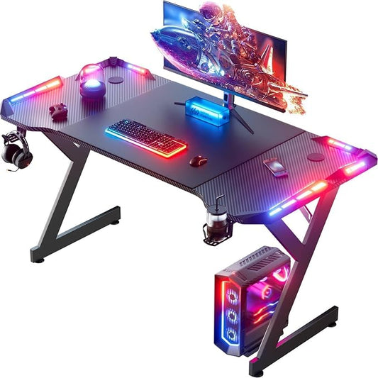HLDIRECT 55 Inch Gaming Desk with LED Lights, Ergonomic Computer Gaming Table with Carbon Fibre Surface, Sturdy PC Workstation Desk for Home Office with Headphone Hook, Cup Holder, Black