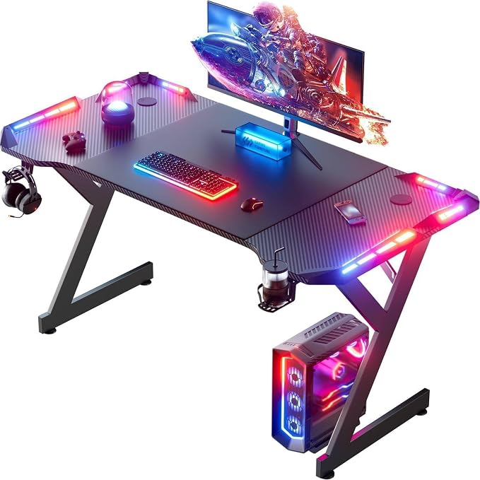 HLDIRECT 47 Inch Gaming Desk with LED Lights, Ergonomic Computer Gaming Table with Carbon Fibre Surface, Sturdy PC Workstation Desk for Home Office with Headphone Hook, Cup Holder, Black