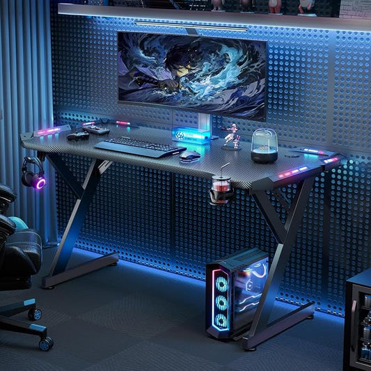 HLDIRECT 55 Inch Gaming Desk with LED Lights, Ergonomic Computer Gaming Table with Carbon Fibre Surface, Sturdy PC Workstation Desk for Home Office with Headphone Hook, Cup Holder, Black