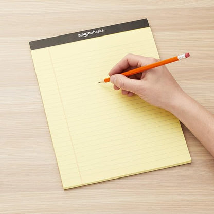 Amazon Basics Wide Ruled Lined Writing Pads, 8.5" x 11.75", Canary, 12-Pack of 50 Perforated Sheets, Sturdy Backing