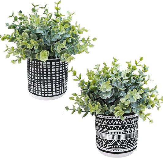 Winlyn Set of 2 Small Potted Plants Artificial Eucalyptus Plant in Black Geometric Ceramic Pots Faux Potted Greenery 7.1" Tall for Desktop Modern Home Office Living Room Kitchen Table Decorations