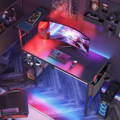 Bestier Gaming Desk with LED Lights, 44 Inch PC Gamer Desk for Small Spaces, Computer Desk with Reversible Storage Shelves & Side Storage Bag (Black Grained)