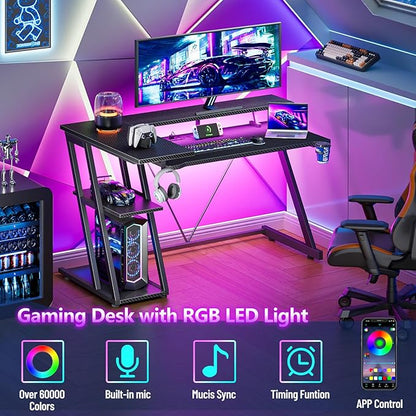 Korfile 40 Inch Gaming Desk with Power Outlet & LED Lights, L Shaped Computer Gaming Table with 3 Tiers Storage Shelves, Corner Gamer Desk with Monitor Stand for Small Space, Carbon Fiber Black