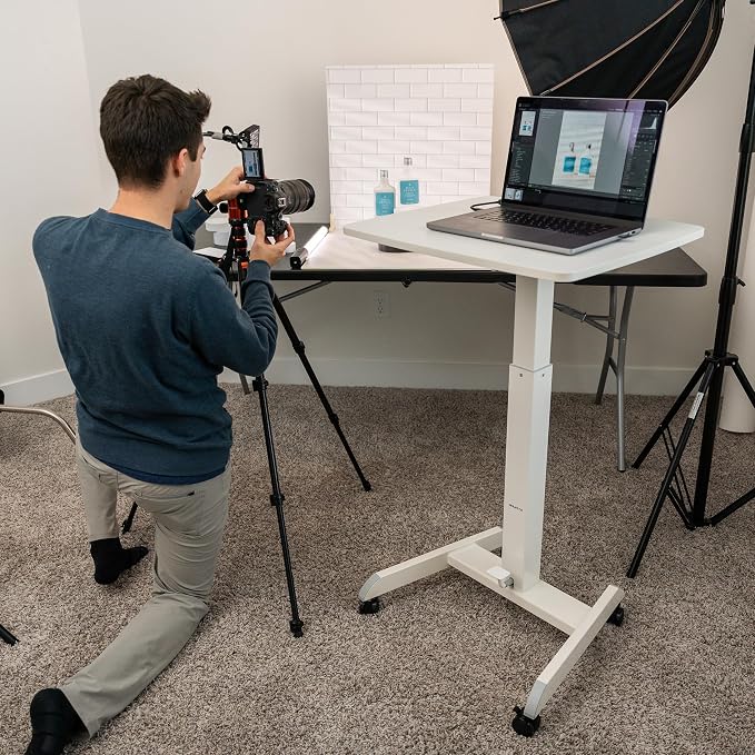 Mount-It! Adjustable Rolling Laptop Desk, Mobile Standing Desk with Wheels, Small Sit-Stand Computer Cart for Home, Office, or Classroom, 29.6–44.2" Height, 23.6"x20.5" Desktop, White