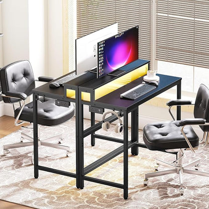 YATINEY Small Computer Desk with Charging Station and LED Lights, Gaming Desk with Monitor Stand, 2-Tier Home Office Desk with 4 Side Hooks, for Living Room, Home Office, Black DN01UDBBY2